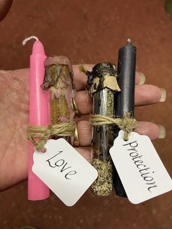 Love and protection candles with herbal vials